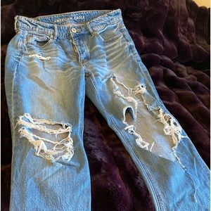 Very ripped blue jeans